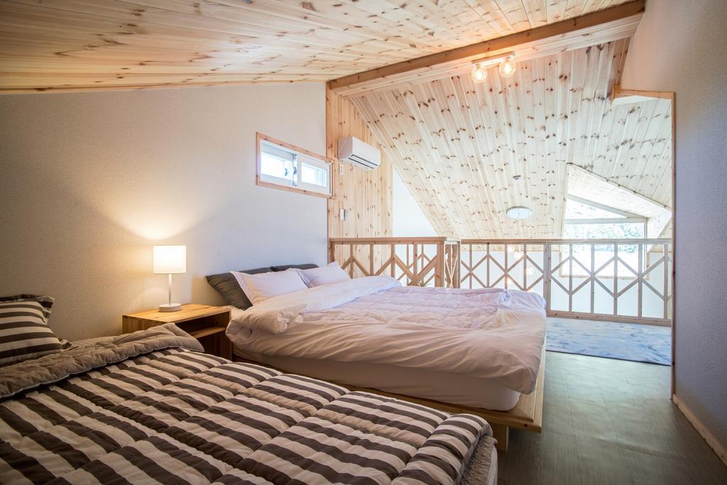Jeju 542 Pension Seogwipo Quarto foto