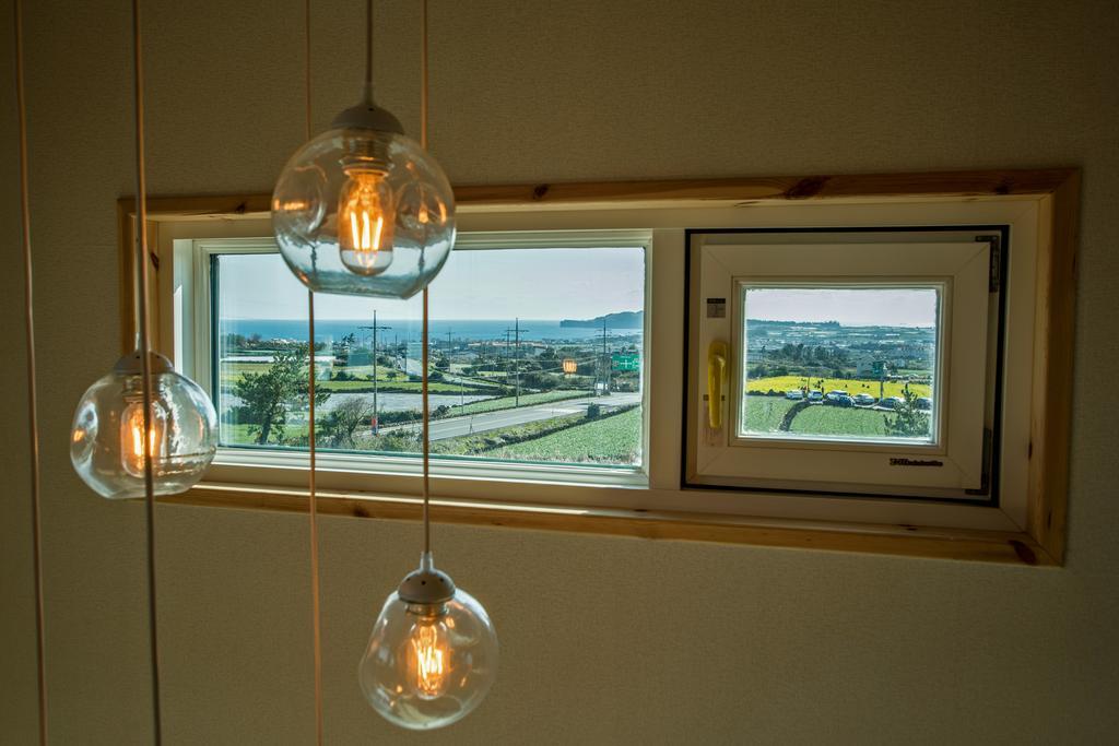 Jeju 542 Pension Seogwipo Quarto foto