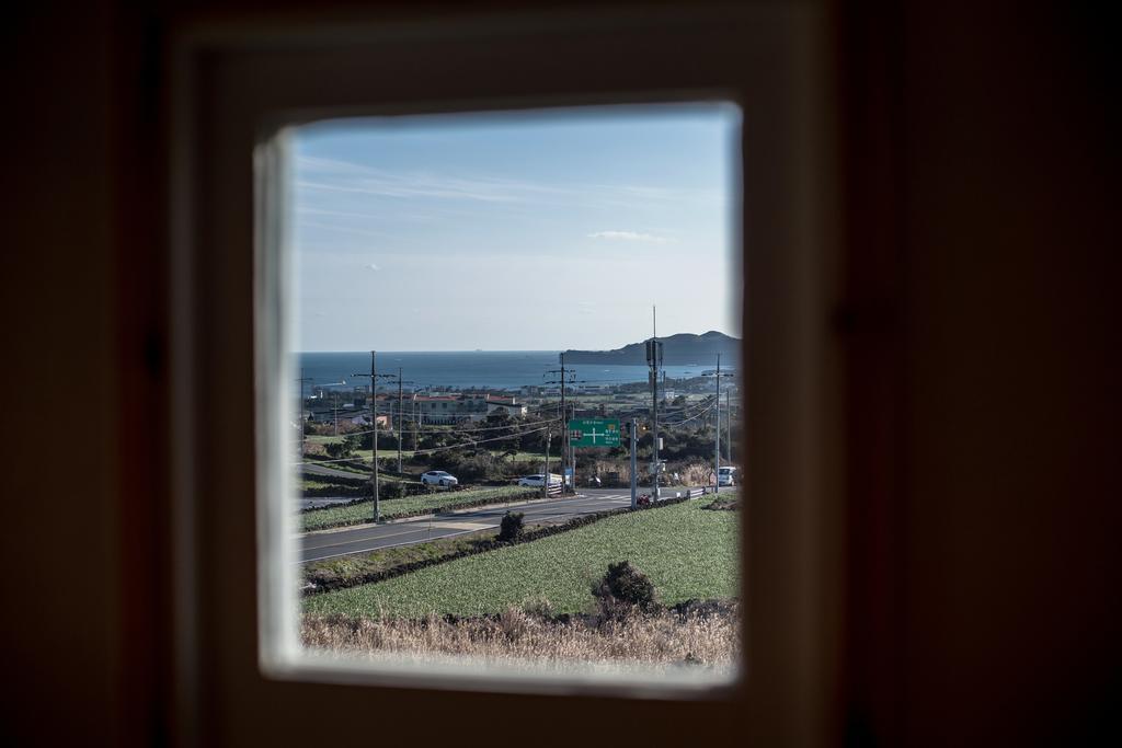 Jeju 542 Pension Seogwipo Quarto foto