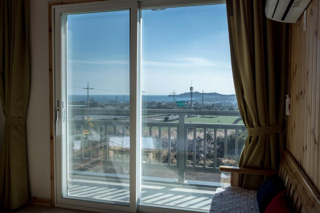 Jeju 542 Pension Seogwipo Quarto foto